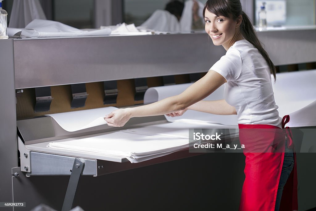 Women working on Industrial Ironing Machines